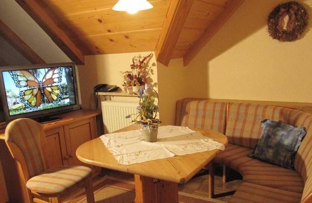 Appartement dans les combles (34 m²) avec un grand jardin et un barbecue
