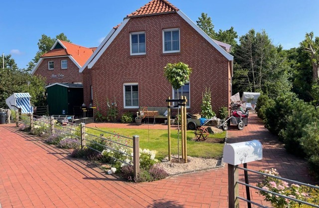 Appartement 'Inselhuuske I I' avec terrasse privée, jardin privé et Wi-Fi