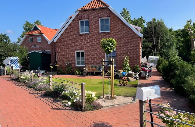 Appartement 'Inselhuuske I' avec terrasse privée, jardin privé et Wi-Fi