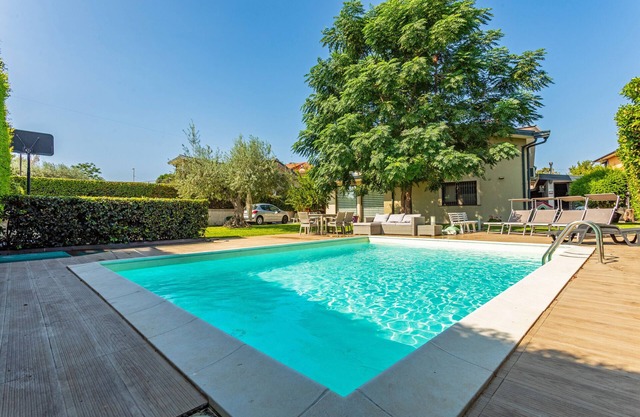 Appartement 'Vanilla Bay Dep' avec piscine privée, jardin privé et climatisation
