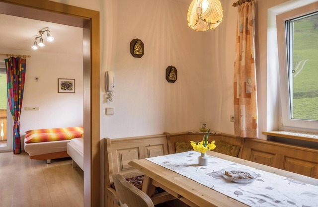 Appartement "Kirchblick" à proximité des stations de ski et de randonnée avec vue sur la montagne