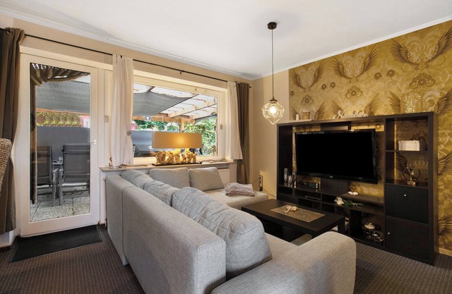 Appartement "Kompass Oase" avec terrasse privée, jardin privé et Wi-Fi