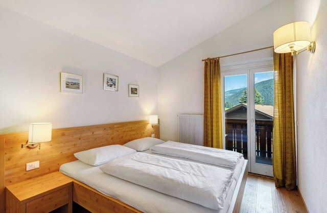 Appartement "Kriendl Nr 3" avec vue sur les montagnes, jardin partagé et Wi-Fi.