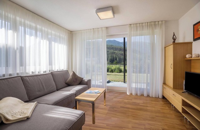 Appartement "Kronsun - Freude" avec vue sur les montagnes, Wi-Fi, terrasse et jardin