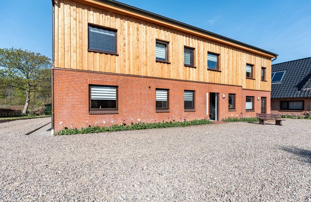 Appartement "Küstenkind" avec terrasse privée, jardin privé et Wi-Fi