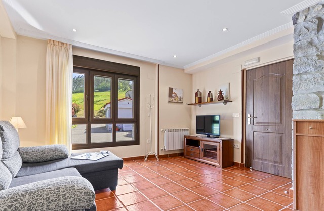 Appartement 'La Cabaña' avec vue sur les montagnes et jardin privé