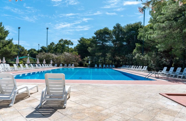 Appartement 'La Casa Di Bebe' avec piscine partagée, Wi-Fi et climatisation