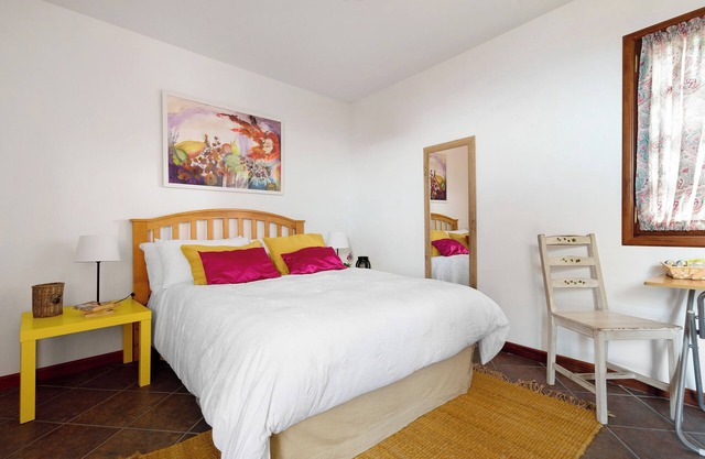 Appartement La Casita Canaria avec vue sur la mer et les montagnes, terrasse et barbecue.