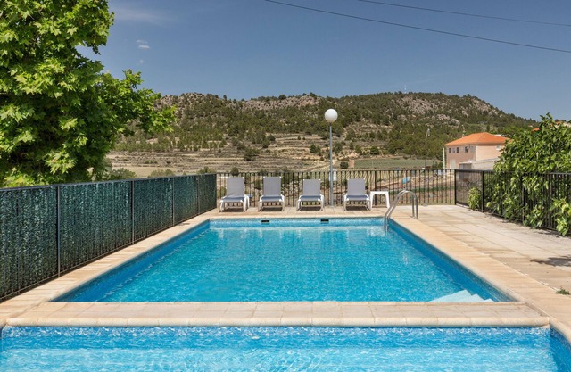 Appartement 'Los Pozos I' avec vue sur la montagne, piscine partagée et Wi-Fi