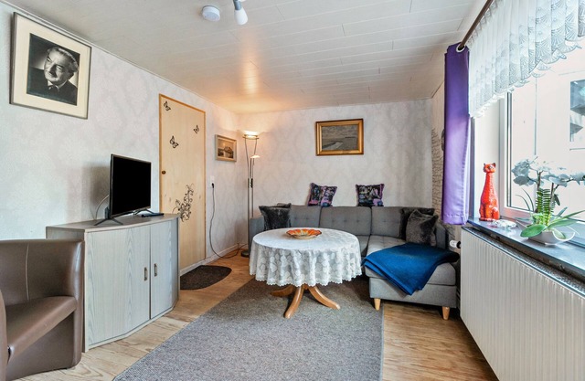 Appartement 'Lüddes Fischerhuus' avec terrasse privée, jardin privé et Wi-Fi
