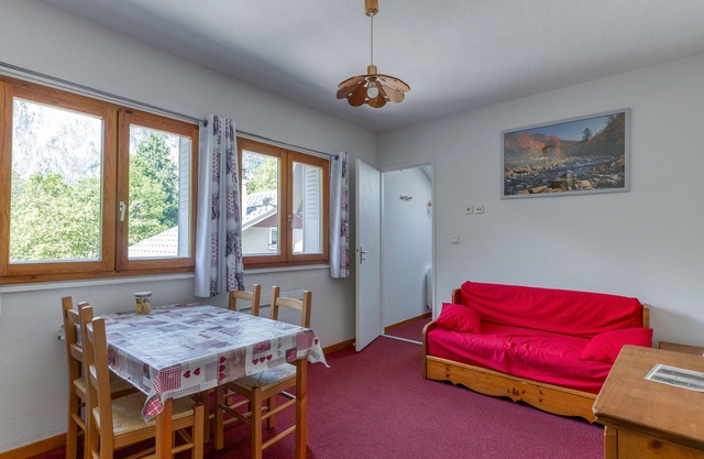 Appartement 'Marmotte' avec vue sur les montagnes, jardin partagé et Wi-Fi