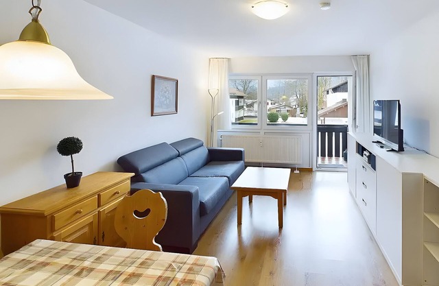 Appartement 'Mit Bergblick, Pool, Sauna' avec vue sur les montagnes, jardin partagé et Wi-Fi