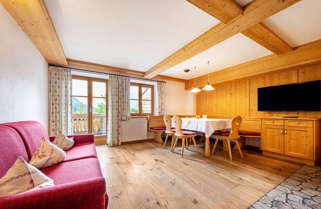 Appartement 'Mitterbruggehof Enzian' avec vue sur les montagnes, jardin partagé et Wi-Fi