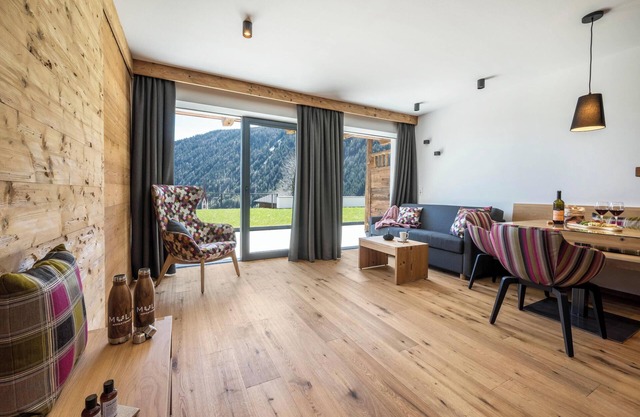 Appartement "Mulin Moidl" près de la station de ski avec vue sur les montagnes, sauna et jardin