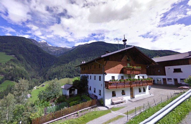 Appartement "Oberhöhe Apt Talblick" avec vue sur les montagnes, terrasse privée et Wi-Fi.