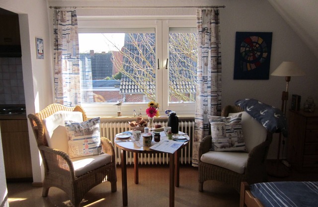 Appartement à l'étage supérieur dans un endroit calme avec jardin