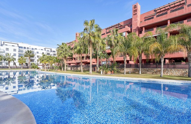Appartement "Playa Granada Golf" avec vue sur la montagne, piscine partagée et Wi-Fi