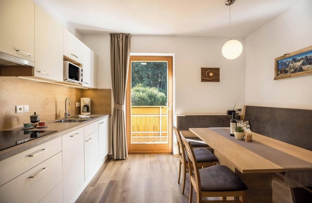 Appartement "Pramstaller Dolomites" avec vue sur les montagnes, Wi-Fi, balcon et jardin
