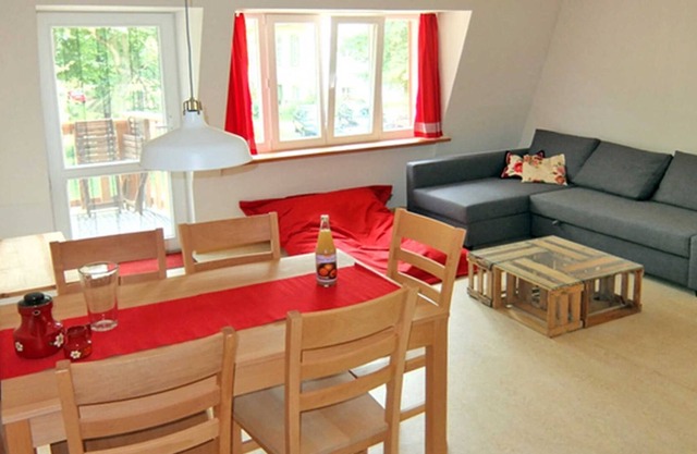 Appartement rouge - vacances à la ferme bio