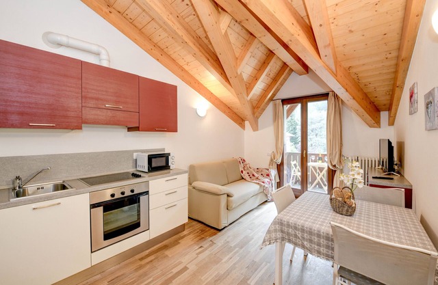 Appartement 'Rosa delle Dolomiti Bilocale3' avec vue sur les montagnes et sauna partagé