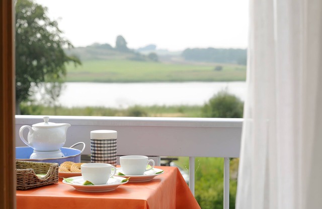 Appartement 'Seeblick Ferienwohnung' avec vue sur le lac, jardin partagé et Wi-Fi