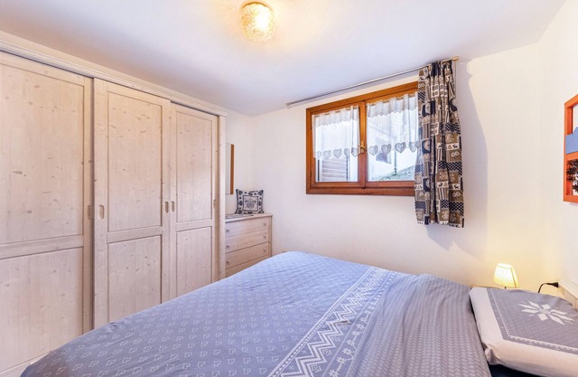 Appartement 'Tesero Margherita' avec vue sur les montagnes, jardin partagé et Wi-Fi