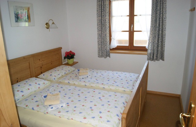 Appartement jusqu'à 4 personnes - Kampenwand - 65 m², 2 chambres, cuisine, TV satellite, balcon, entrée indépendante, non-fumeur