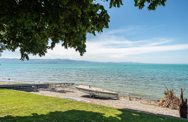 Appartement "Villa NoHo" avec vue sur le lac, jardin et Wi-Fi.