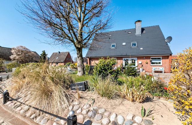 Appartement "Wattlöwe Tönning" avec terrasse privée, jardin privé et Wi-Fi