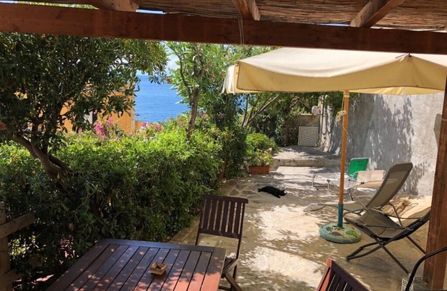 Appartement avec jardin avec vue sur la mer à Pomonte, à 50 mètres de la côte