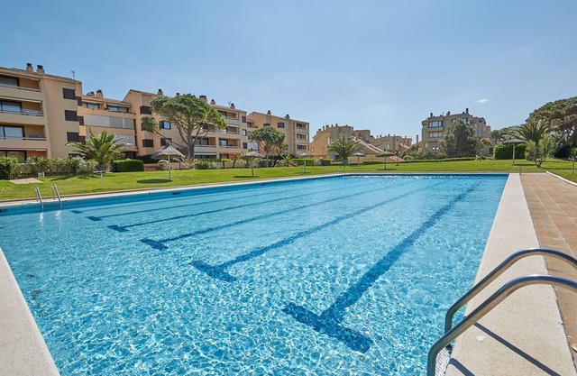 Appartement avec jardin et piscine - Première ligne Plage de Pals (GM 2H 411)