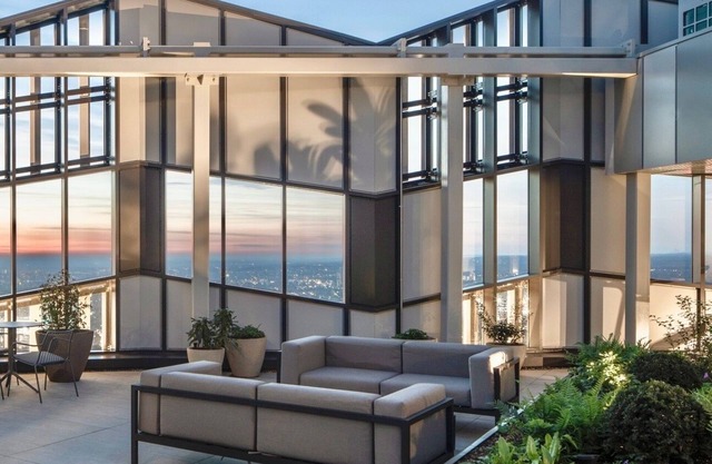 Apartment with Workspace and Sky Library
