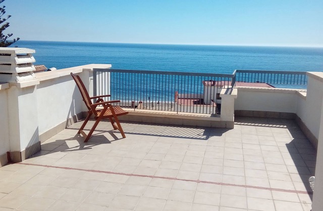 Appartement avec terrasse sur le toit à côté de la plage