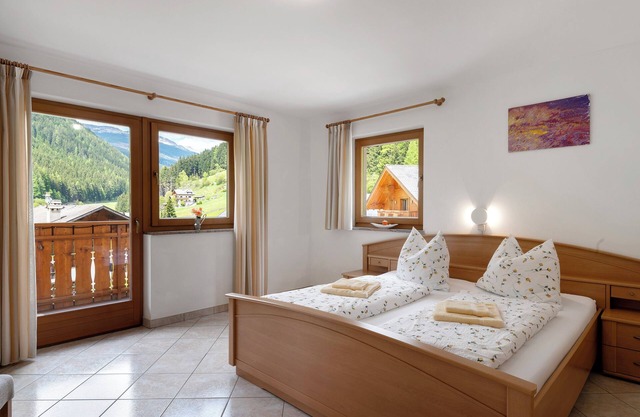 Appartement "Wohnung 2" avec vue sur les montagnes, jardin partagé et Wi-Fi