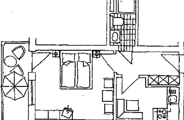 Appartement avec kitchenette, mobilier confortable et balcon