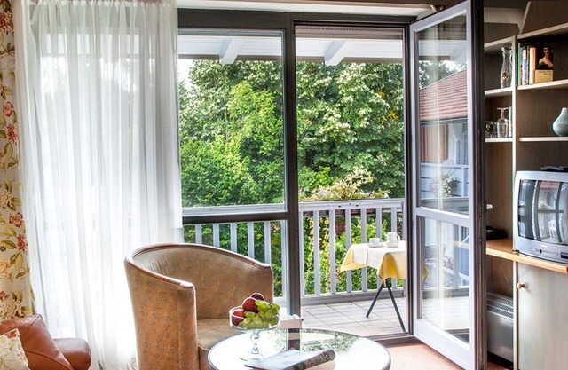 Appartement avec balcon orienté au sud et mobilier confortable