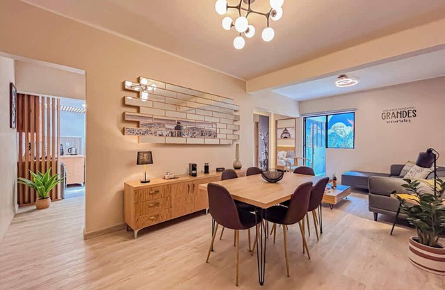 Art-Filled Apartment with Terraces, Downtown & Garden