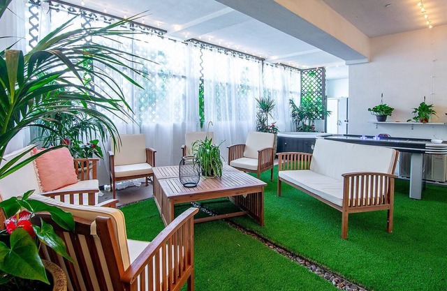 Artfully arranged, open and inviting 2 bedroom suite with a private yard.