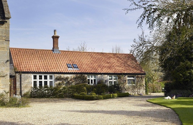 Comme présenté dans 25 Beautiful Homes, le Manor Stables offre 4 * confort et de luxe