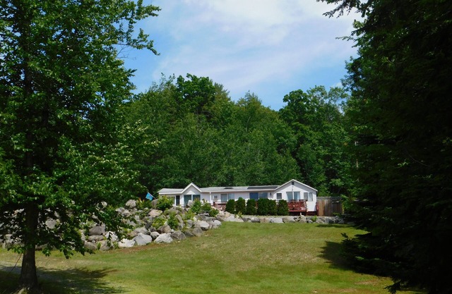 Brandy Pond oasis with sprawling lawn leading to expansive sandy beach!