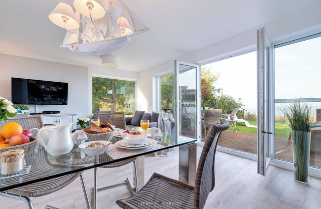 Nouvel appartement fantastique au bord de l'eau avec sauna, terrasse ensoleillée, 2 chambres à coucher