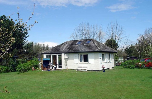 Maison de plage avec bungalow cheminée