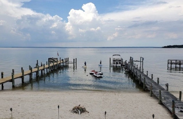 Beach & River Retreat. Spectacular house with private sand beach and hot tub!