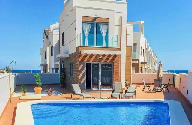 Beach villa with panoramic sea and mountain views