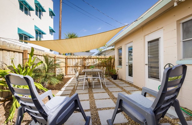 Beachfront Bungalow. Your Costal Retreat. 1st floor with Private Backyard