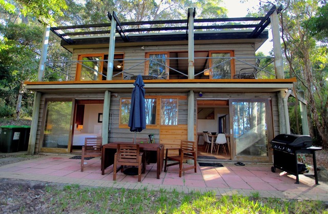 Beachgum: a cozy cabin on a wooded acre of beachfront with its own tennis court.