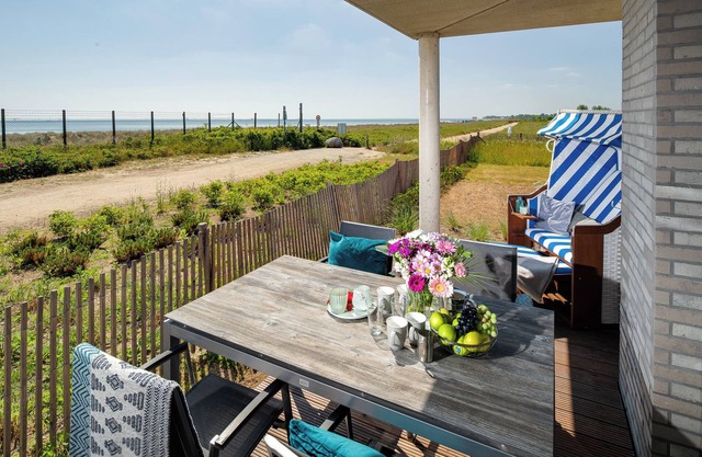 "BeachTerraceFour" vacation apartment on the beach with sun terrace, sauna & sea view