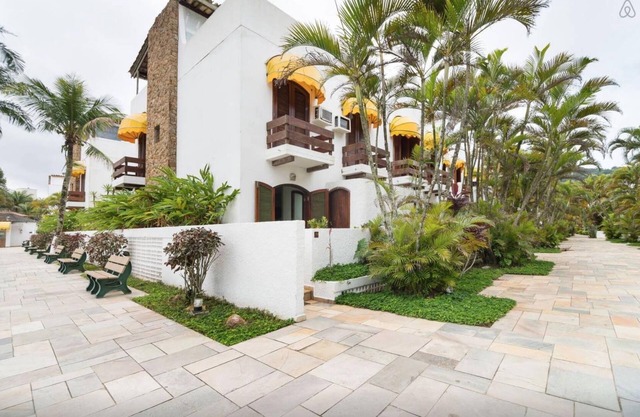 Belle maison pied dans le sable