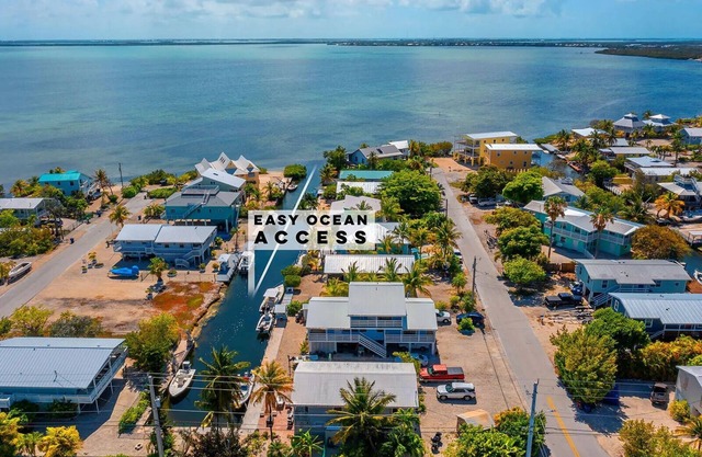 Beautiful 2-bedroom canal home with peak-a-boo open water views in Cudjoe Key