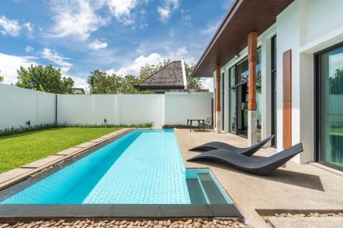 Beautiful 3 bedroom pool villa with 65inch smart tv Located near popular Bangtao beach and laguna Phuket